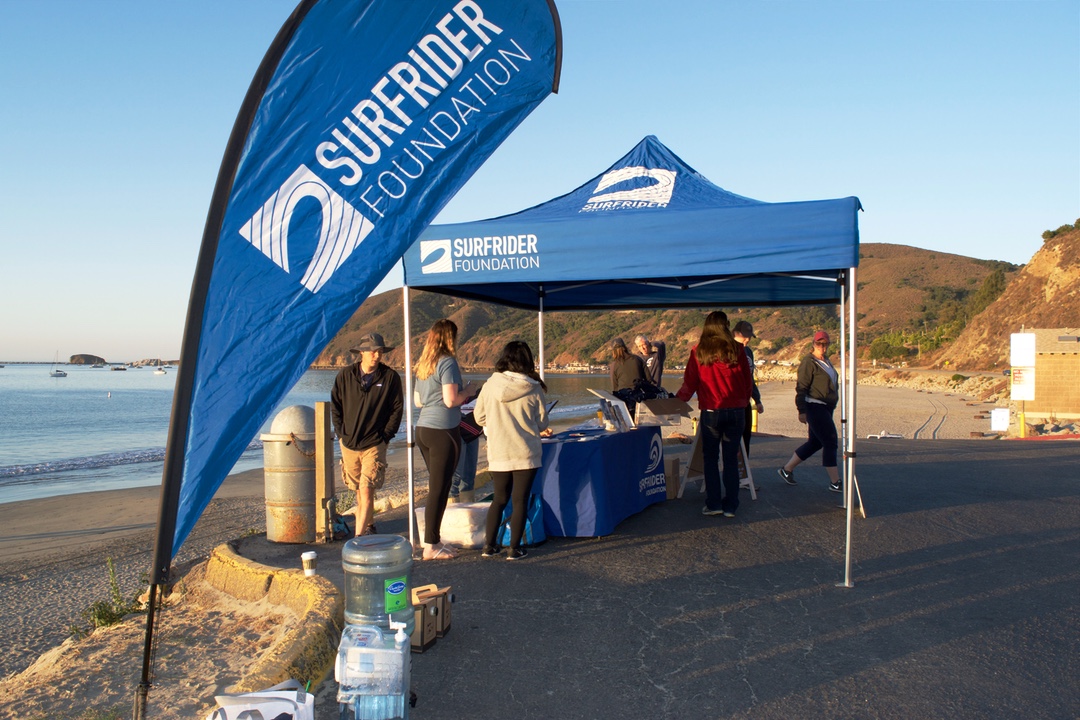 The San Luis Obispo (SLO) chapter of Surfrider, a national organization dedicated to protecting the coastline, spent the early morning hours of Saturday Oct.12 gearing up for their 25th annual Paddle for Clean Water event at Olde Port Beach in Avila. This event is of great significance to the local chapter, since it was this event that provided the seed money for Surfrider SLO 25 years ago. The event was first held for Ken Harmount, a former Morro Bay lifeguard, to pay for his medical bills after he became paralyzed in a snowboarding accident. Instead of using the money for himself, Harmount used it to start a local Surfrider chapter. “Our chapter was born out of Ken Harmount’s generosity,” said Brad Snook the Chairman of Surfrider’s SLO chapter.